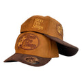 Gorra Bass Pro Shop Marrón en Gamuza con Bordado en Relieve y Visera Oscura.