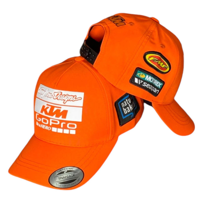 Gorra KTM Naranja con Estampado y Parches Laterales.