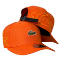 Gorra Lacoste Naranja con Cierre de Cuero y Bordado en Relieve.