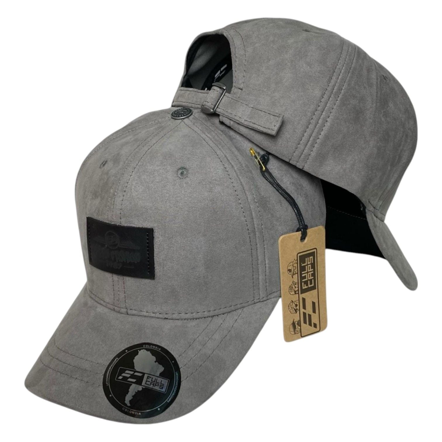 Gorra Full Caps Gris en Gamuza con Parche de Cuero y Cierre Metálico.