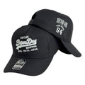 Gorra Superdry Negra con Bordado en Relieve y Estampado Japonés.