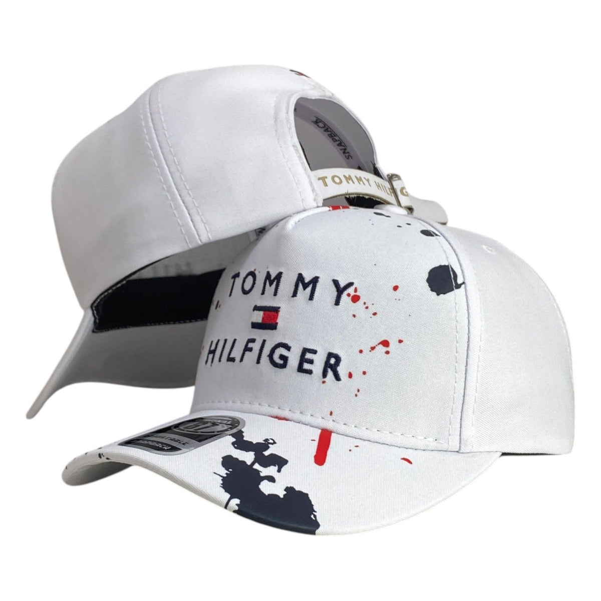 Gorra Tommy Blanca con Estampado de Salpicaduras y Bordado en Relieve.