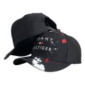 Gorra Tommy Negra con Estampado de Salpicaduras y Bordado en Relieve.