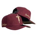 Gorra FE Vinotinto en Gamuza con Bordado en Relieve y Cierre de Cuero.