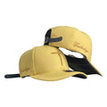 Gorra FE Amarilla con Bordado de Cruz y Cierre de Cuero.