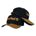Gorra Timberland Negra en Gamuza con Visera Miel y Bordado en Relieve.