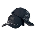 Gorra Coach Negra con Estampado de Monograma y Parche de Cuero.