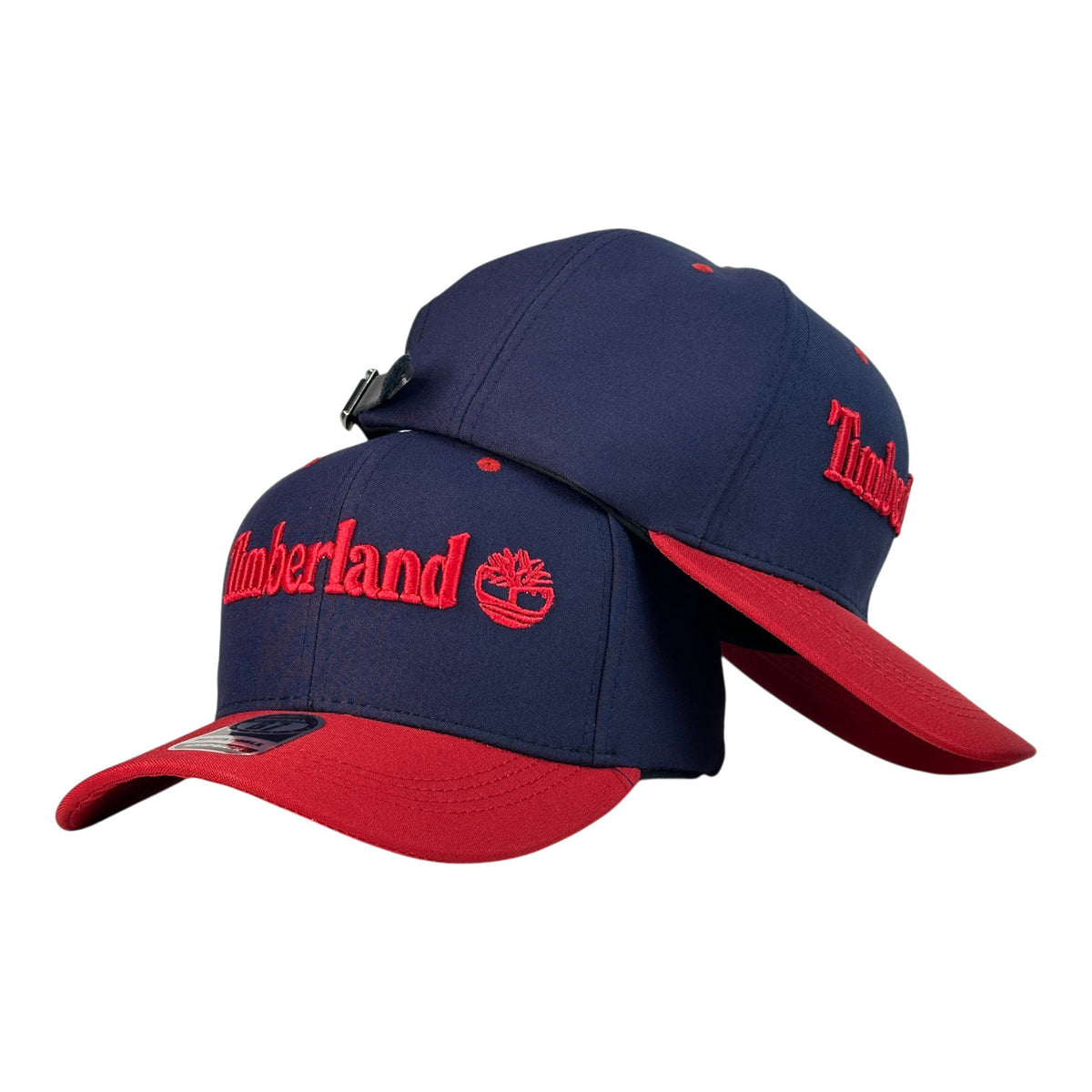 Gorra Timberland Azul con Visera Roja y Bordado en Relieve.