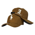 Gorra Polo Marrón en Gamuza con Bordado en Relieve y Cierre de Cuero.