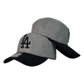 Gorra Equipos Gris en Gamuza con visera negra y bordado en relieve.