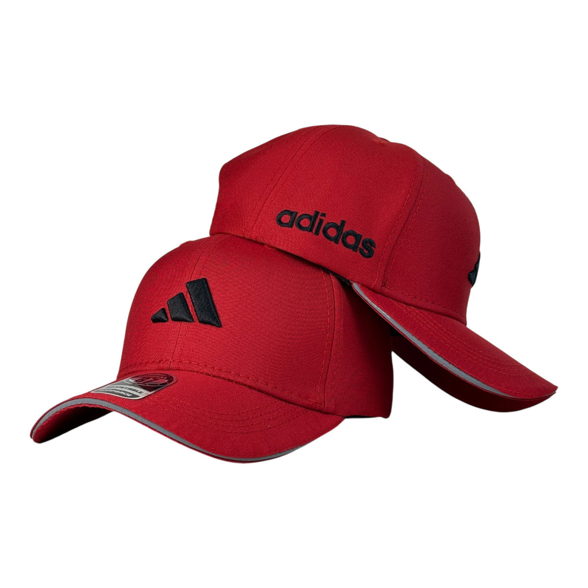 Gorra Adidas Roja con bordado en relieve y visera con borde reflectante.