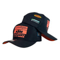 Gorra KTM Negra con Estampado y Visera Naranja.