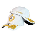 Gorra Tommy Blanca con Bordado en Relieve y Visera con Hojas Doradas.